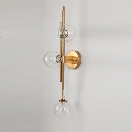 Glass Orb Sconce Lighting Fixture Mid Century 3-Bulb Brass Finish Wall Lamp for Living Room Clear Clearhalo 'Cast Iron' 'Glass' 'Industrial' 'Modern wall lights' 'Modern' 'Tiffany' 'Traditional wall lights' 'Wall Lamps & Sconces' 'Wall Lights' Lighting' 2467053