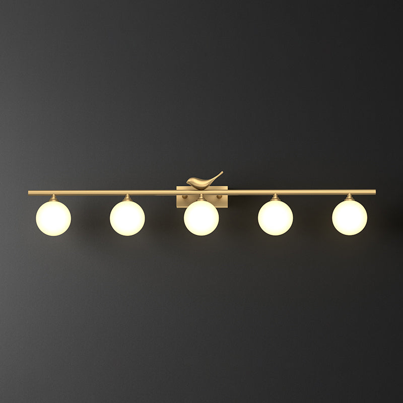 Ball Bathroom Vanity Sconce Opal Glass Postmodern Wall Light with Bird Decor in Brass 5.0 Brass Clearhalo 'Cast Iron' 'Glass' 'Industrial' 'Modern wall lights' 'Modern' 'Tiffany' 'Traditional wall lights' 'Vanity Lights' 'Wall Lights' Lighting' 2467203