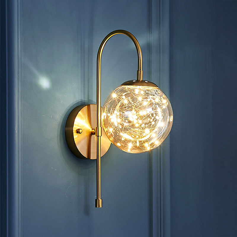 Ball Shaped Wall Light Fixture Postmodern Clear Glass Gold Wall Sconce with Starry LED String Gold Arc Clearhalo 'Cast Iron' 'Glass' 'Industrial' 'Modern wall lights' 'Modern' 'Tiffany' 'Traditional wall lights' 'Wall Lamps & Sconces' 'Wall Lights' Lighting' 2467321