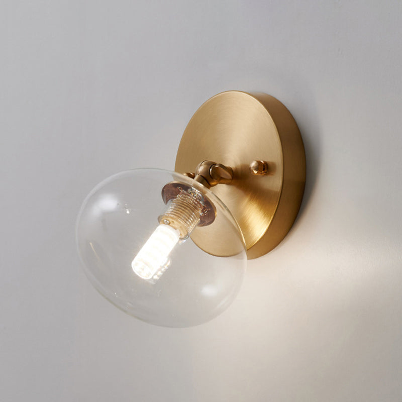 Small Corridor Rotatable Wall Sconce Glass Single Postmodern Wall Mounted Light in Brass Brass Oval Clearhalo 'Cast Iron' 'Glass' 'Industrial' 'Modern wall lights' 'Modern' 'Tiffany' 'Traditional wall lights' 'Wall Lamps & Sconces' 'Wall Lights' Lighting' 2467500