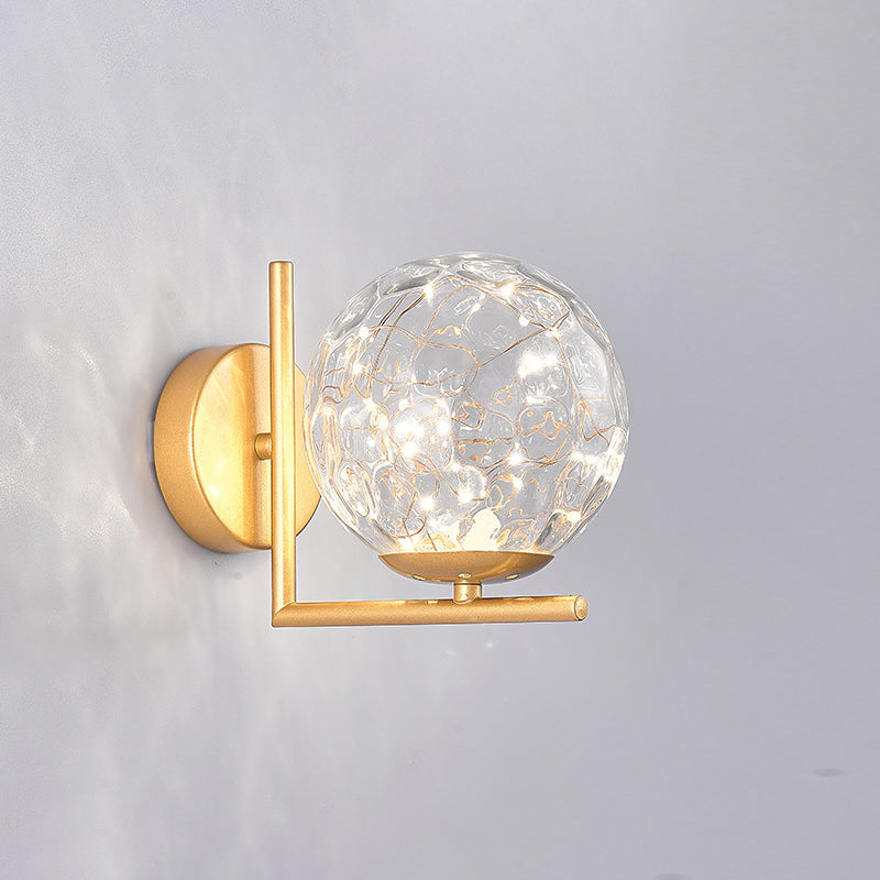 Glass Mini Globe Wall Sconce Designer Style LED Wall Mount Light Fixture for Bedroom Gold Prismatic Glass Clearhalo 'Cast Iron' 'Glass' 'Industrial' 'Modern wall lights' 'Modern' 'Tiffany' 'Traditional wall lights' 'Wall Lamps & Sconces' 'Wall Lights' Lighting' 2467906