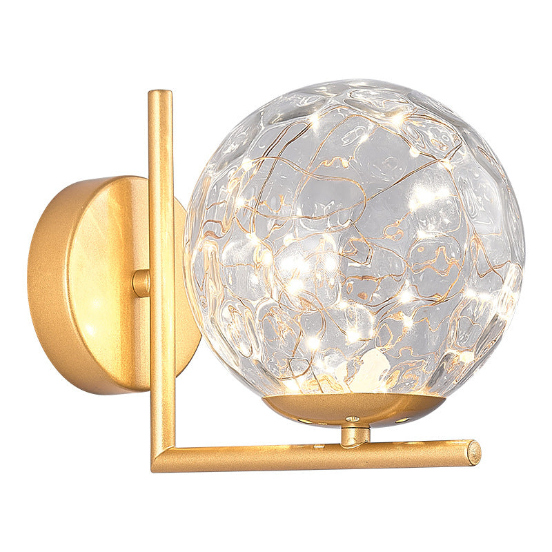 Glass Mini Globe Wall Sconce Designer Style LED Wall Mount Light Fixture for Bedroom Clearhalo 'Cast Iron' 'Glass' 'Industrial' 'Modern wall lights' 'Modern' 'Tiffany' 'Traditional wall lights' 'Wall Lamps & Sconces' 'Wall Lights' Lighting' 2467910