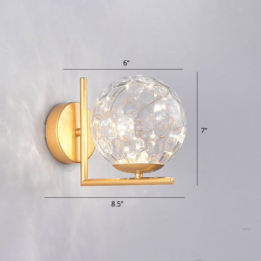 Glass Mini Globe Wall Sconce Designer Style LED Wall Mount Light Fixture for Bedroom Clearhalo 'Cast Iron' 'Glass' 'Industrial' 'Modern wall lights' 'Modern' 'Tiffany' 'Traditional wall lights' 'Wall Lamps & Sconces' 'Wall Lights' Lighting' 2467914