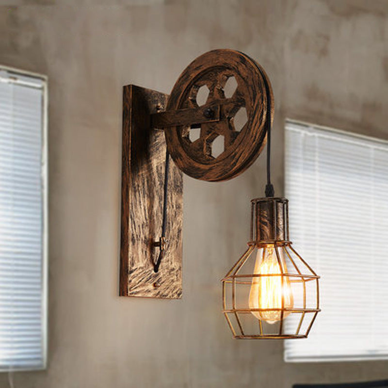 Spherical Wire Cage Foyer Wall Light Rustic Iron 1-Light Bedroom Wall Mount Lamp with Pulley Bronze Clearhalo 'Art deco wall lights' 'Cast Iron' 'Glass' 'Industrial wall lights' 'Industrial' 'Middle century wall lights' 'Modern' 'Rustic wall lights' 'Tiffany' 'Traditional wall lights' 'Wall Lamps & Sconces' 'Wall Lights' Lighting' 2468038