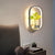Decorative Halo LED Wall Sconce Metal Bedroom Wall Light Fixture with Glass Hydroponic Pot White Oval Clearhalo 'Art deco wall lights' 'Cast Iron' 'Glass' 'Industrial wall lights' 'Industrial' 'Middle century wall lights' 'Modern' 'Rustic wall lights' 'Tiffany' 'Traditional wall lights' 'Wall Lamps & Sconces' 'Wall Lights' Lighting' 2468227