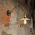 Saucer Living Room Sconce Light Fixture Rustic Style Prismatic Glass 1 Light Black/Silver/Brass Wall Lamp Black Clearhalo 'Cast Iron' 'Glass' 'Industrial wall lights' 'Industrial' 'Middle century wall lights' 'Modern' 'Tiffany' 'Traditional wall lights' 'Wall Lamps & Sconces' 'Wall Lights' Lighting' 247644