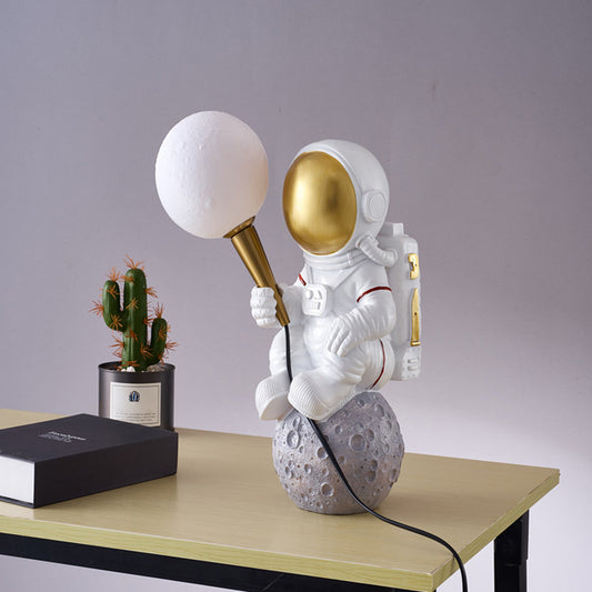 Creative Cartoon Spaceman Table Lamp Resin 1 Head Child Room Nightstand Light in White Clearhalo 'Lamps' 'Table Lamps' Lighting' 2478186