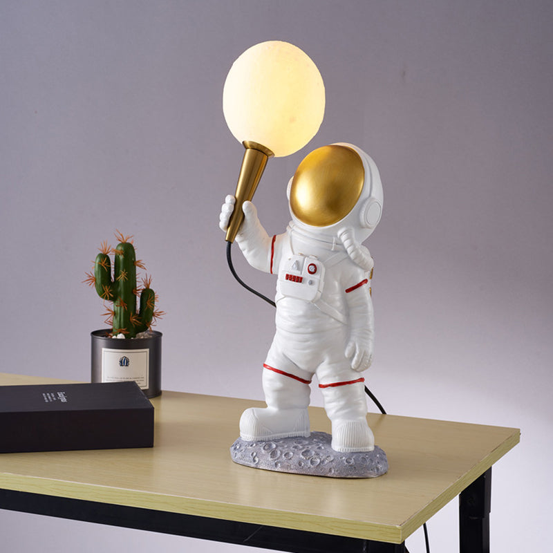 Creative Cartoon Spaceman Table Lamp Resin 1 Head Child Room Nightstand Light in White White Standing Clearhalo 'Lamps' 'Table Lamps' Lighting' 2478188