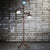 Weathered Bronze Pipe Floor Light Industrial Iron 2-Bulb Living Room Quadpod Floor Lamp with Saucer Lampshade Weathered Copper Clearhalo 'Floor Lamps' 'Lamps' Lighting' 2479046