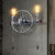 1/2-Head Bare Bulb Wall Mount Light Industrial Style Silver/Bronze/Antique Brass Wrought Iron Wall Lighting with Wheel Decoration 2.0 Silver Clearhalo 'Art deco wall lights' 'Cast Iron' 'Glass' 'Industrial wall lights' 'Industrial' 'Middle century wall lights' 'Modern' 'Rustic wall lights' 'Tiffany' 'Traditional wall lights' 'Wall Lamps & Sconces' 'Wall Lights' Lighting' 248222
