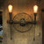 1/2-Head Bare Bulb Wall Mount Light Industrial Style Silver/Bronze/Antique Brass Wrought Iron Wall Lighting with Wheel Decoration 2.0 Bronze Clearhalo 'Art deco wall lights' 'Cast Iron' 'Glass' 'Industrial wall lights' 'Industrial' 'Middle century wall lights' 'Modern' 'Rustic wall lights' 'Tiffany' 'Traditional wall lights' 'Wall Lamps & Sconces' 'Wall Lights' Lighting' 248224