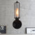 1/2-Bulb Linear Cage Sconce Lamp Industrial Black/Rust Metal Wall Light Fixture for Living Room 1.0 Black Clearhalo 'Art deco wall lights' 'Cast Iron' 'Glass' 'Industrial wall lights' 'Industrial' 'Middle century wall lights' 'Modern' 'Rustic wall lights' 'Tiffany' 'Traditional wall lights' 'Wall Lamps & Sconces' 'Wall Lights' Lighting' 248282