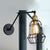 Black Globe/Teardrop Wall Sconce Lighting with Cage Shade Retro Metal 1 Light Arm Adjustable Wall Mount Light Black Lantern Clearhalo 'Art deco wall lights' 'Cast Iron' 'Glass' 'Industrial wall lights' 'Industrial' 'Middle century wall lights' 'Modern' 'Rustic wall lights' 'Tiffany' 'Traditional wall lights' 'Wall Lamps & Sconces' 'Wall Lights' Lighting' 248448
