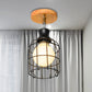 1 Bulb Wire Cage Semi-Flush Ceiling Fixture Industrial Loft Black Metallic Rotatable Ceiling Mounted Fixture, 4"/5.5" Dia Black 5.5" Clearhalo 'Ceiling Lights' 'Close To Ceiling Lights' 'Close to ceiling' 'Semi-flushmount' Lighting' 248567