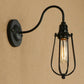Metallic Oval/Teardrop/Bulb Wall Lighting with Wire Guard Industrial 1 Light Balcony Wall Mounted Lamp in Black Clearhalo 'Art deco wall lights' 'Cast Iron' 'Glass' 'Industrial wall lights' 'Industrial' 'Middle century wall lights' 'Modern' 'Rustic wall lights' 'Tiffany' 'Traditional wall lights' 'Wall Lamps & Sconces' 'Wall Lights' Lighting' 248606