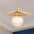 Mid Century Flat Shade Ceiling Fixture 1 Bulb Metallic Pendant Lighting in Brass Finish over Table Brass Clearhalo 'Art Deco Pendants' 'Cast Iron' 'Ceiling Lights' 'Ceramic' 'Crystal' 'Industrial Pendants' 'Industrial' 'Metal' 'Middle Century Pendants' 'Pendant Lights' 'Pendants' 'Tiffany' Lighting' 248688