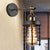 Metal Caged Wall Lighting Industrial Rustic 1 Light Indoor Mini Wall Mount Light with Cylindrical Shade Black Clearhalo 'Art deco wall lights' 'Cast Iron' 'Glass' 'Industrial wall lights' 'Industrial' 'Middle century wall lights' 'Modern' 'Rustic wall lights' 'Tiffany' 'Traditional wall lights' 'Wall Lamps & Sconces' 'Wall Lights' Lighting' 248859