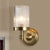 Cylinder Wall Lamp Vintage Stylish Clear Ribbed Glass 1 Bulb Black/Gold Finish Wall Sconce Fixture for Living Room Brass Clearhalo 'Modern wall lights' 'Modern' 'Wall Lamps & Sconces' 'Wall Lights' Lighting' 250407