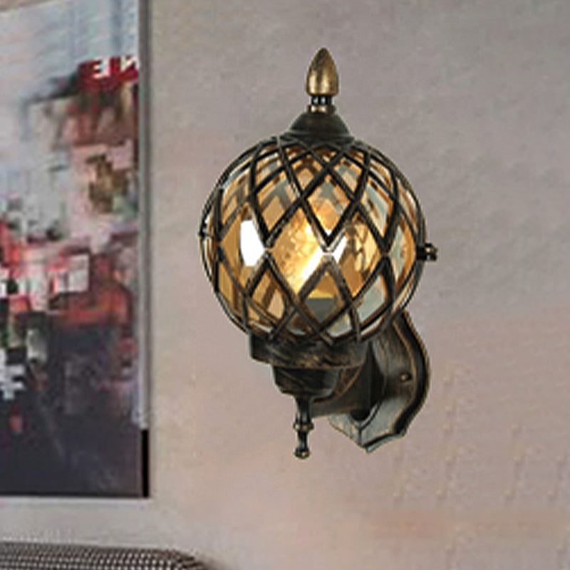 1 Light Amber Glass Wall Sconce Light Industrial Black Globe Dining Room Lighting Fixture with Cage Clearhalo 'Art deco wall lights' 'Cast Iron' 'Glass' 'Industrial wall lights' 'Industrial' 'Middle century wall lights' 'Modern' 'Rustic wall lights' 'Tiffany' 'Traditional wall lights' 'Wall Lamps & Sconces' 'Wall Lights' Lighting' 250572