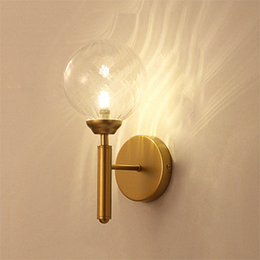 Clear Glass Brass Sconce Light Sphere 1-Light Modern Wall Lamp Fixture for Bedroom Clear Clearhalo 'Cast Iron' 'Glass' 'Industrial' 'Modern wall lights' 'Modern' 'Tiffany' 'Traditional wall lights' 'Wall Lamps & Sconces' 'Wall Lights' Lighting' 250576