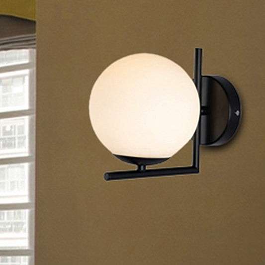 1 Bulb Globe Wall Mounted Light Fixture Modern Black Opal Glass Lighting with Frame Decoration White Clearhalo 'Cast Iron' 'Glass' 'Industrial' 'Modern wall lights' 'Modern' 'Tiffany' 'Traditional wall lights' 'Wall Lamps & Sconces' 'Wall Lights' Lighting' 250617