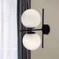 Black Spherical Wall Lighting Modern Opal Glass 1 Light Living Room Sconce Light Fixture Clearhalo 'Cast Iron' 'Glass' 'Industrial' 'Modern wall lights' 'Modern' 'Tiffany' 'Traditional wall lights' 'Wall Lamps & Sconces' 'Wall Lights' Lighting' 250629