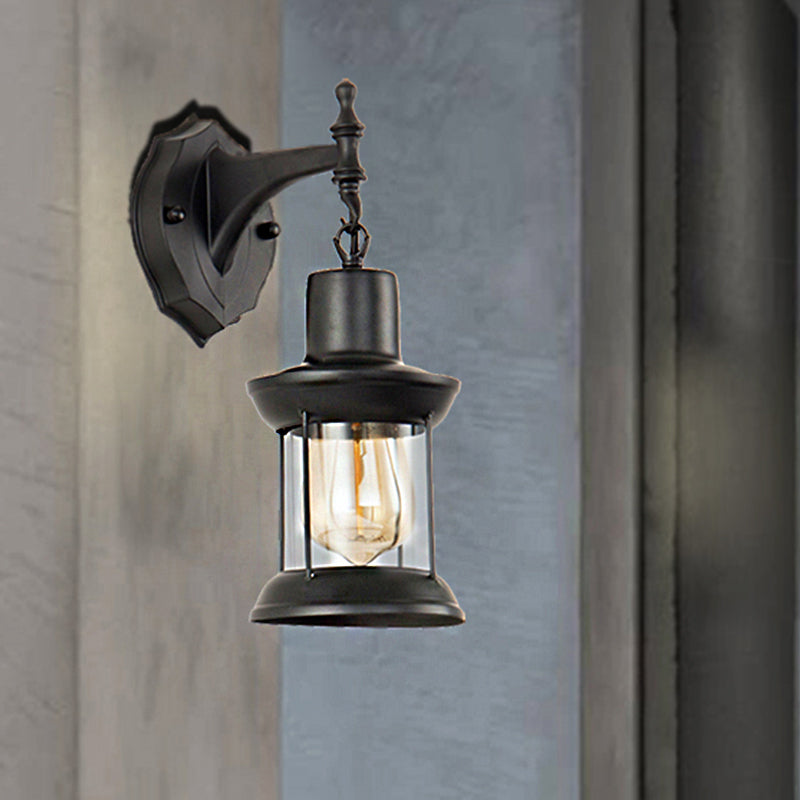 Clear Glass Black Sconce Light Lantern 1-Light Industrial Wall Lamp Fixture for Kitchen Clearhalo 'Art deco wall lights' 'Cast Iron' 'Glass' 'Industrial wall lights' 'Industrial' 'Middle century wall lights' 'Modern' 'Rustic wall lights' 'Tiffany' 'Traditional wall lights' 'Wall Lamps & Sconces' 'Wall Lights' Lighting' 250633