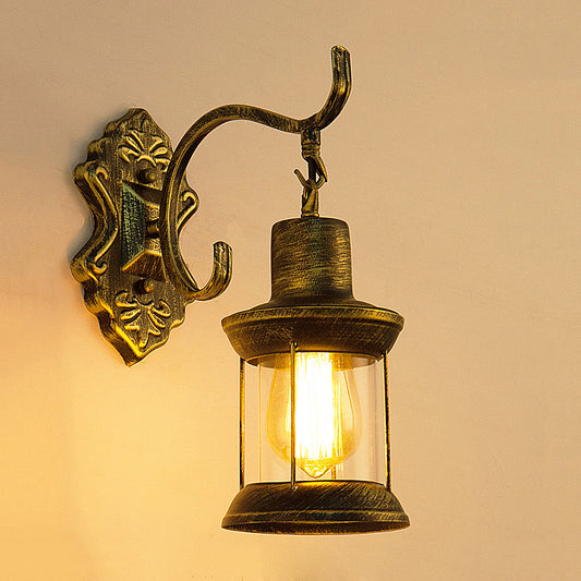 1 Bulb Kerosene Wall Mounted Light Fixture Rustic Style Aged Bronze Clear Glass Lighting with Carved Pattern Clearhalo 'Art deco wall lights' 'Cast Iron' 'Glass' 'Industrial wall lights' 'Industrial' 'Middle century wall lights' 'Modern' 'Rustic wall lights' 'Tiffany' 'Traditional wall lights' 'Wall Lamps & Sconces' 'Wall Lights' Lighting' 250656