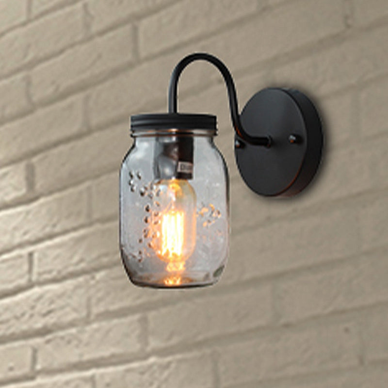 Black Jar Shade Wall Lighting Industrial Clear Glass 1 Light Bedroom Sconce Light Fixture with Flower Grain Clear Clearhalo 'Cast Iron' 'Glass' 'Industrial' 'Modern wall lights' 'Modern' 'Tiffany' 'Traditional wall lights' 'Wall Lamps & Sconces' 'Wall Lights' Lighting' 250704