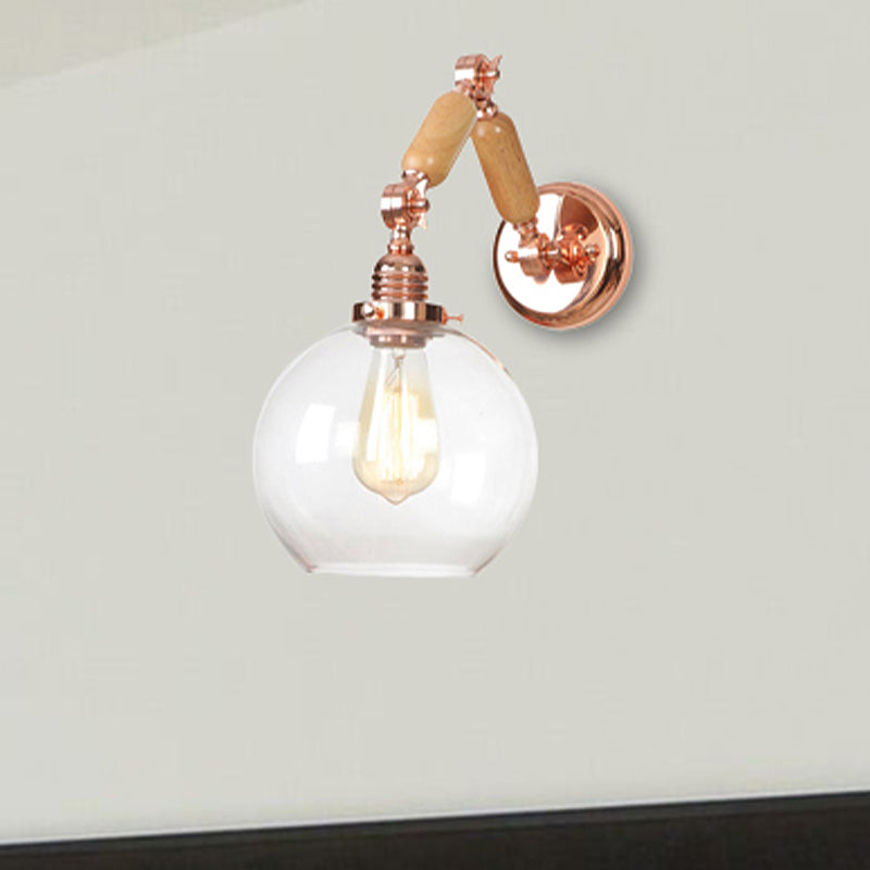 1 Bulb Globe Wall Mounted Light Fixture Rustic Rose Gold Clear Glass Lighting with Extendable Arm Clearhalo 'Cast Iron' 'Glass' 'Industrial wall lights' 'Industrial' 'Middle century wall lights' 'Modern' 'Tiffany' 'Traditional wall lights' 'Wall Lamps & Sconces' 'Wall Lights' Lighting' 251032