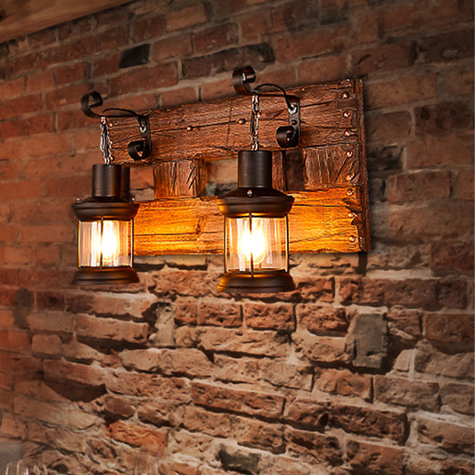 Clear Glass Black Wall Sconce Lighting Lantern 2-Light Industrial Light Fixture with Wooden Backplate Clearhalo 'Industrial wall lights' 'Industrial' 'Middle century wall lights' 'Rustic wall lights' 'Tiffany' 'Wall Lamps & Sconces' 'Wall Lights' Lighting' 253100