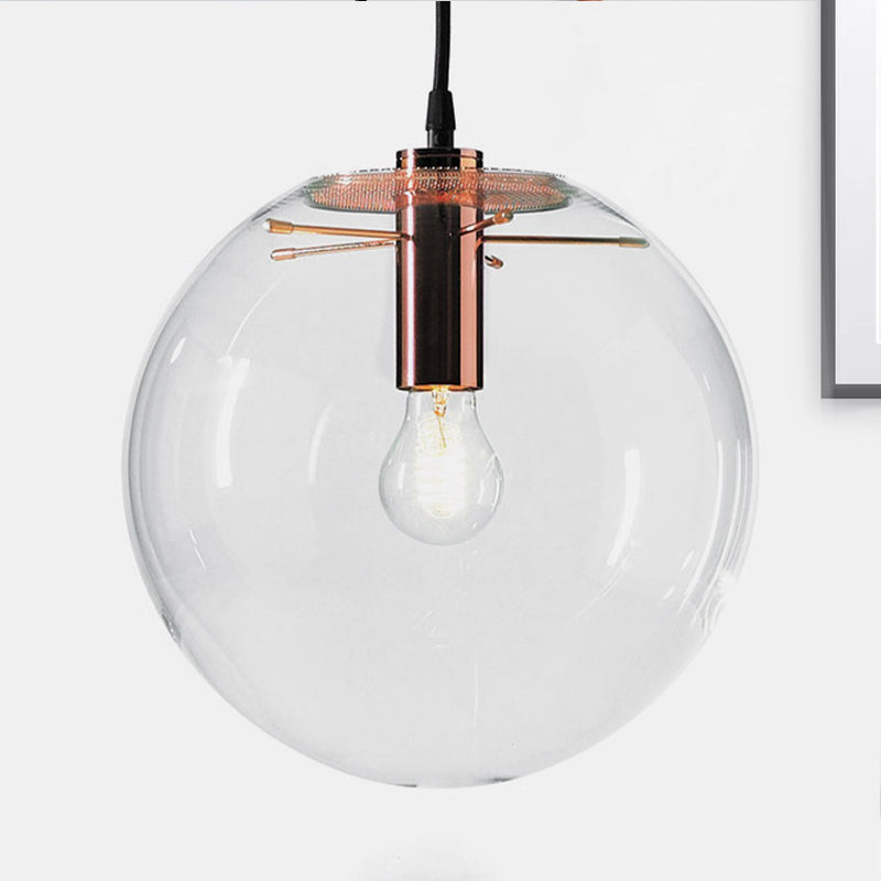Round Pendant Light Modern 1-Light 6"/8"/12" Wide Clear Glass Hanging Lamp in Rose Gold Clearhalo 'Ceiling Lights' 'Close To Ceiling Lights' 'Glass shade' 'Glass' 'Industrial Pendants' 'Industrial' 'Middle Century Pendants' 'Pendant Lights' 'Pendants' 'Tiffany' Lighting' 253645