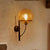 1 Light Globe Sconce Light Fixture Industrial Black Clear Glass Wall Lamp for Coffee Shop Black Clearhalo 'Cast Iron' 'Glass' 'Industrial wall lights' 'Industrial' 'Middle century wall lights' 'Modern' 'Tiffany' 'Traditional wall lights' 'Wall Lamps & Sconces' 'Wall Lights' Lighting' 253685