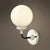 Modern Globe Shade Wall Lighting Fixture 1/2-Bulb Opal Glass Sconce Light in Antique Brass/Chrome 1.0 Chrome Clearhalo 'Cast Iron' 'Glass' 'Industrial wall lights' 'Industrial' 'Middle century wall lights' 'Modern' 'Tiffany' 'Traditional wall lights' 'Wall Lamps & Sconces' 'Wall Lights' Lighting' 253724