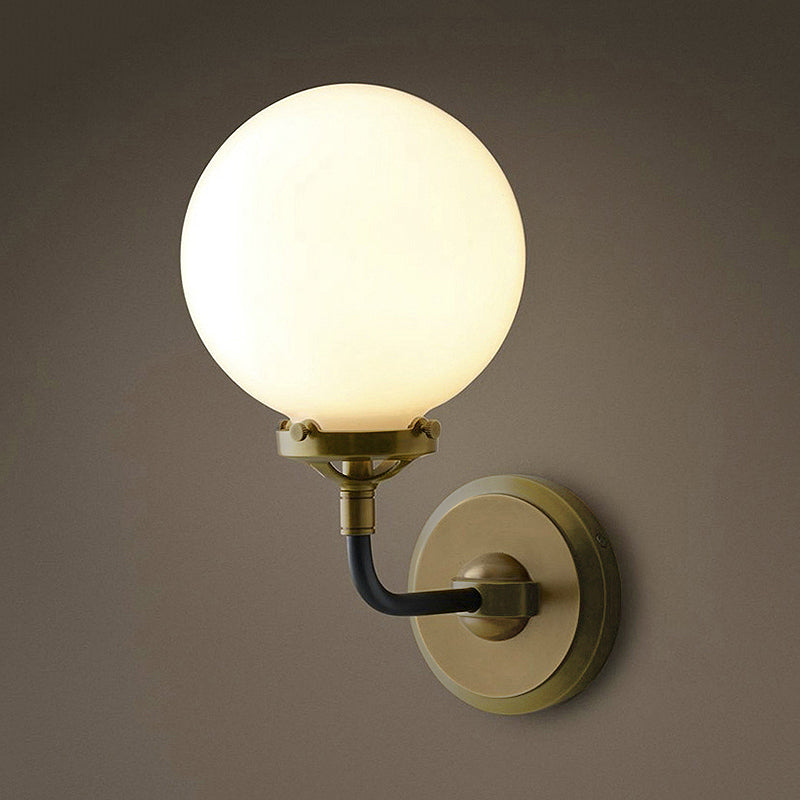 Modern Globe Shade Wall Lighting Fixture 1/2-Bulb Opal Glass Sconce Light in Antique Brass/Chrome 1.0 Antique Brass Clearhalo 'Cast Iron' 'Glass' 'Industrial wall lights' 'Industrial' 'Middle century wall lights' 'Modern' 'Tiffany' 'Traditional wall lights' 'Wall Lamps & Sconces' 'Wall Lights' Lighting' 253727