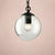 Black Globe Pendant Ceiling Light Farmhouse Clear Glass Single-Bulb Dining Room Hanging Lamp with Chain, 8"/10"/12" Wide Clear Clearhalo 'Ceiling Lights' 'Glass shade' 'Glass' 'Industrial Pendants' 'Industrial' 'Middle Century Pendants' 'Pendant Lights' 'Pendants' 'Tiffany' Lighting' 253894