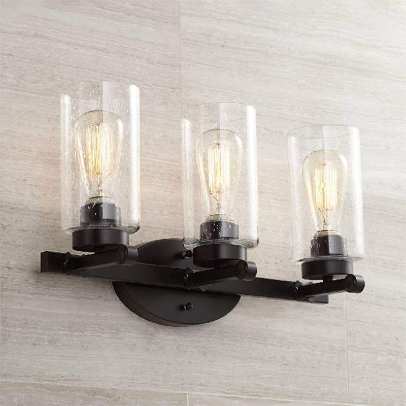 3-Bulb Seeded Glass Sconce Light Fixture Industrial Black Cylinder Dining Room Wall Lamp in Clear Clearhalo 'Cast Iron' 'Glass' 'Industrial wall lights' 'Industrial' 'Middle century wall lights' 'Modern' 'Tiffany' 'Traditional wall lights' 'Wall Lamps & Sconces' 'Wall Lights' Lighting' 254080
