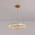 Twisted Ring Shaped Chandelier Modern Crystal LED Brass Suspension Light for Dining Room Brass 23.5" Clearhalo 'Ceiling Lights' 'Chandeliers' 'Modern Chandeliers' 'Modern' Lighting' 2546837