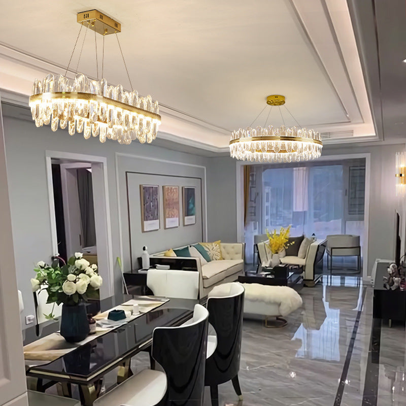 Circle Dining Room Pendant Lighting Crystal LED Minimalistic Chandelier in Brass Clearhalo 'Ceiling Lights' 'Chandeliers' 'Modern Chandeliers' 'Modern' Lighting' 2546888