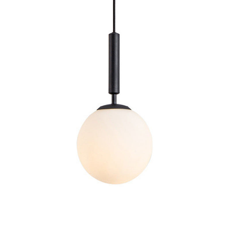 Globe Hanging Ceiling Light Modern White Glass Pendant Lamp for Bedroom Black 8" Clearhalo 'Ceiling Lights' 'Glass shade' 'Glass' 'Modern Pendants' 'Modern' 'Pendant Lights' 'Pendants' Lighting' 2548906