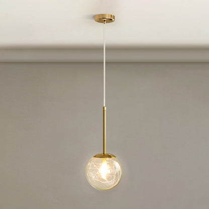 Spherical Glass Hanging Ceiling Light Modern 1 Light Bedroom Pendant Lamp in Gold Gold 5.5" Linear Clearhalo 'Ceiling Lights' 'Glass shade' 'Glass' 'Modern Pendants' 'Modern' 'Pendant Lights' 'Pendants' Lighting' 2548934