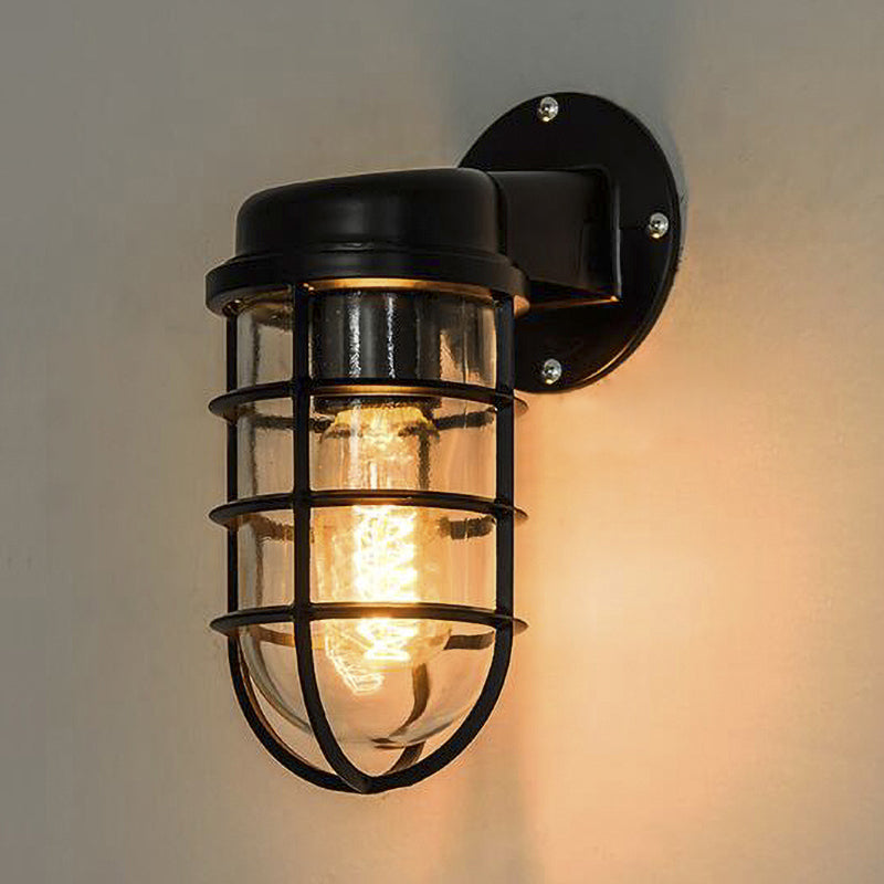 Clear Glass Black/White/Rust Sconce Light Cylinder 1-Light Traditional Wall Lamp Fixture for Porch with Caged Black Clearhalo 'Art deco wall lights' 'Cast Iron' 'Glass' 'Industrial wall lights' 'Industrial' 'Middle century wall lights' 'Modern' 'Rustic wall lights' 'Tiffany' 'Traditional wall lights' 'Wall Lamps & Sconces' 'Wall Lights' Lighting' 255287