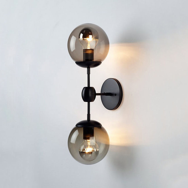 Black 2-Light Sconce Light Industrial Amber Glass Globe Shade Lighting Fixture for Living Room Clearhalo 'Art deco wall lights' 'Cast Iron' 'Glass' 'Industrial wall lights' 'Industrial' 'Middle century wall lights' 'Modern' 'Rustic wall lights' 'Tiffany' 'Traditional wall lights' 'Wall Lamps & Sconces' 'Wall Lights' Lighting' 255307