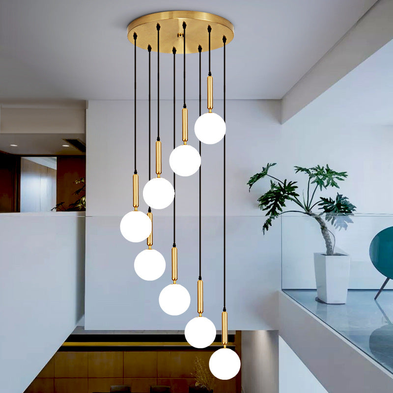 Modern Minimalist Multiple Globe Shade Pendant Light Metal Long Hanging Lamp for Living Room Clearhalo 'Ceiling Lights' 'Close To Ceiling Lights' 'Glass shade' 'Glass' 'Modern Pendants' 'Modern' 'Pendant Lights' 'Pendants' Lighting' 2556873