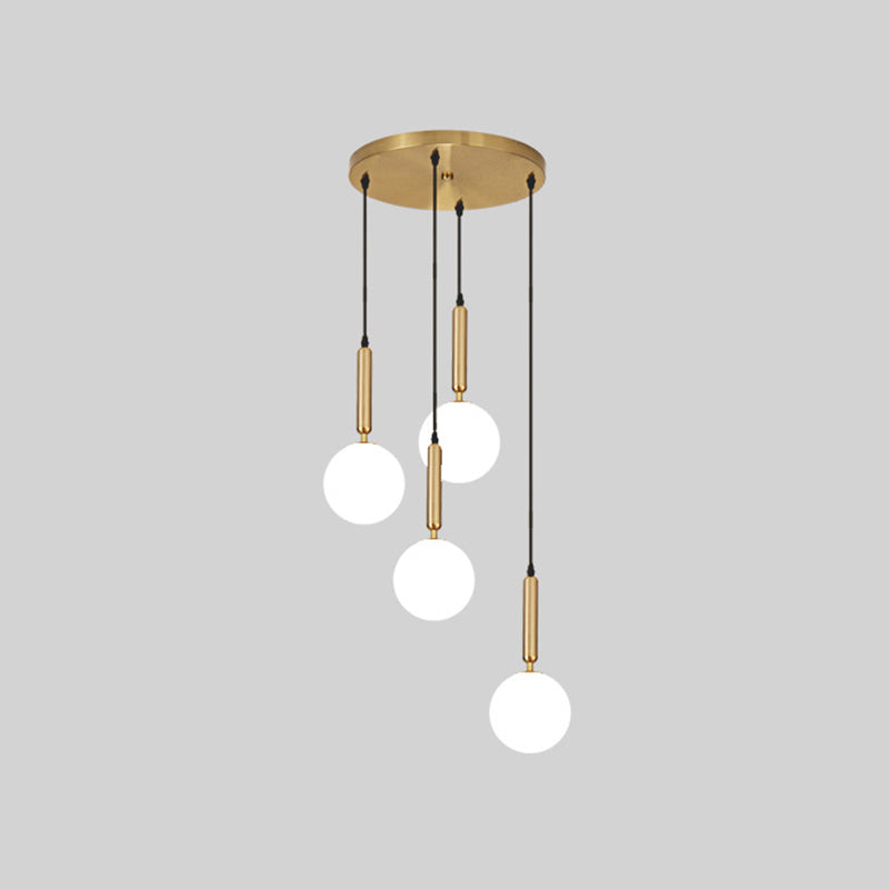 Modern Minimalist Multiple Globe Shade Pendant Light Metal Long Hanging Lamp for Living Room 4 Brass Clearhalo 'Ceiling Lights' 'Close To Ceiling Lights' 'Glass shade' 'Glass' 'Modern Pendants' 'Modern' 'Pendant Lights' 'Pendants' Lighting' 2556876