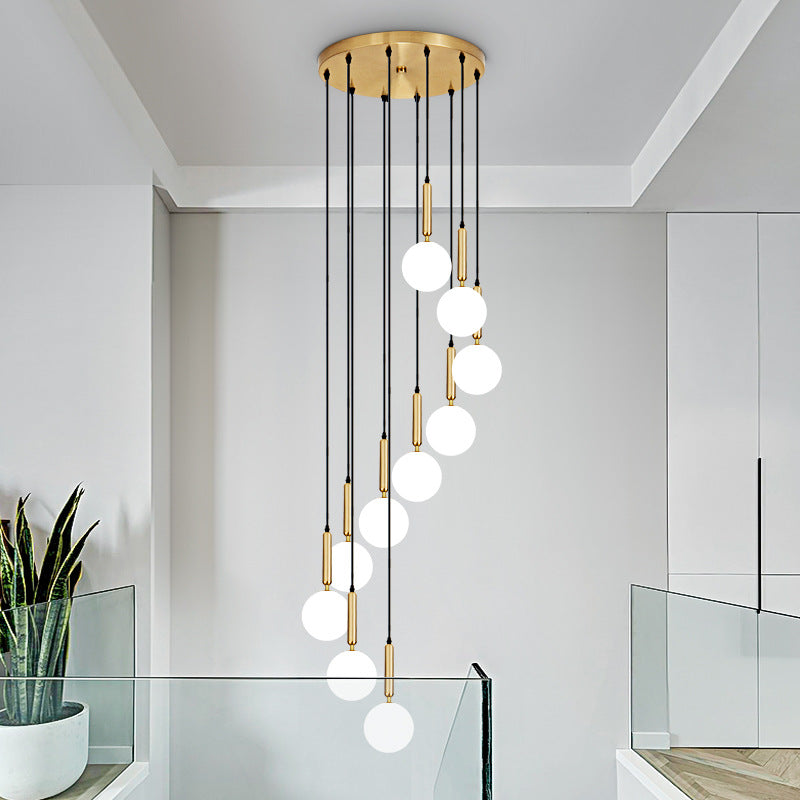 Modern Minimalist Multiple Globe Shade Pendant Light Metal Long Hanging Lamp for Living Room Clearhalo 'Ceiling Lights' 'Close To Ceiling Lights' 'Glass shade' 'Glass' 'Modern Pendants' 'Modern' 'Pendant Lights' 'Pendants' Lighting' 2556877