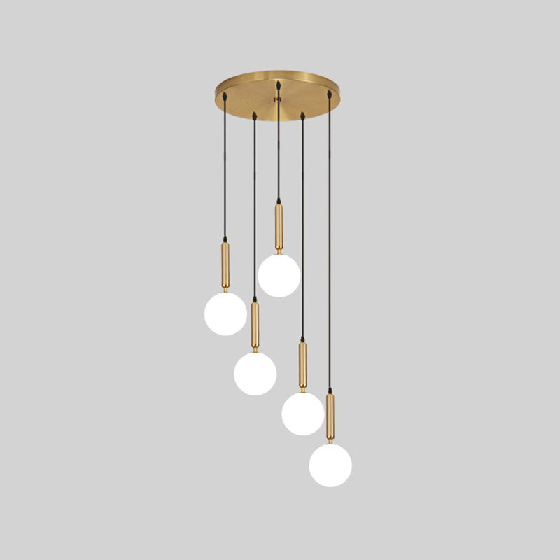 Modern Minimalist Multiple Globe Shade Pendant Light Metal Long Hanging Lamp for Living Room 5 Brass Clearhalo 'Ceiling Lights' 'Close To Ceiling Lights' 'Glass shade' 'Glass' 'Modern Pendants' 'Modern' 'Pendant Lights' 'Pendants' Lighting' 2556878