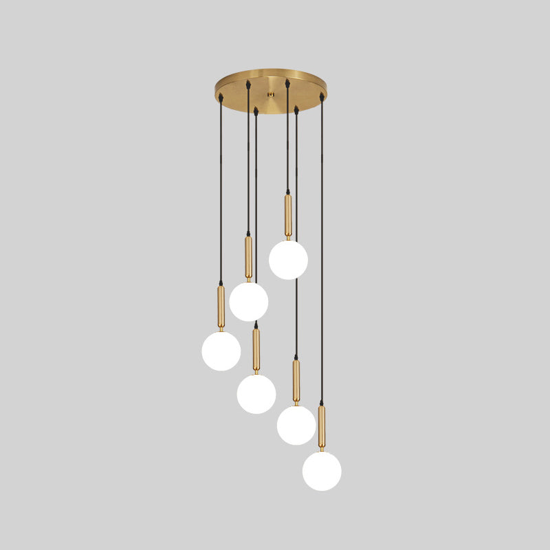 Modern Minimalist Multiple Globe Shade Pendant Light Metal Long Hanging Lamp for Living Room 6 Brass Clearhalo 'Ceiling Lights' 'Close To Ceiling Lights' 'Glass shade' 'Glass' 'Modern Pendants' 'Modern' 'Pendant Lights' 'Pendants' Lighting' 2556879