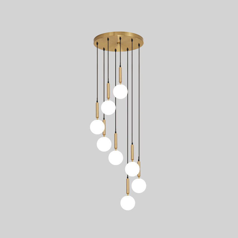Modern Minimalist Multiple Globe Shade Pendant Light Metal Long Hanging Lamp for Living Room 8 Brass Clearhalo 'Ceiling Lights' 'Close To Ceiling Lights' 'Glass shade' 'Glass' 'Modern Pendants' 'Modern' 'Pendant Lights' 'Pendants' Lighting' 2556881