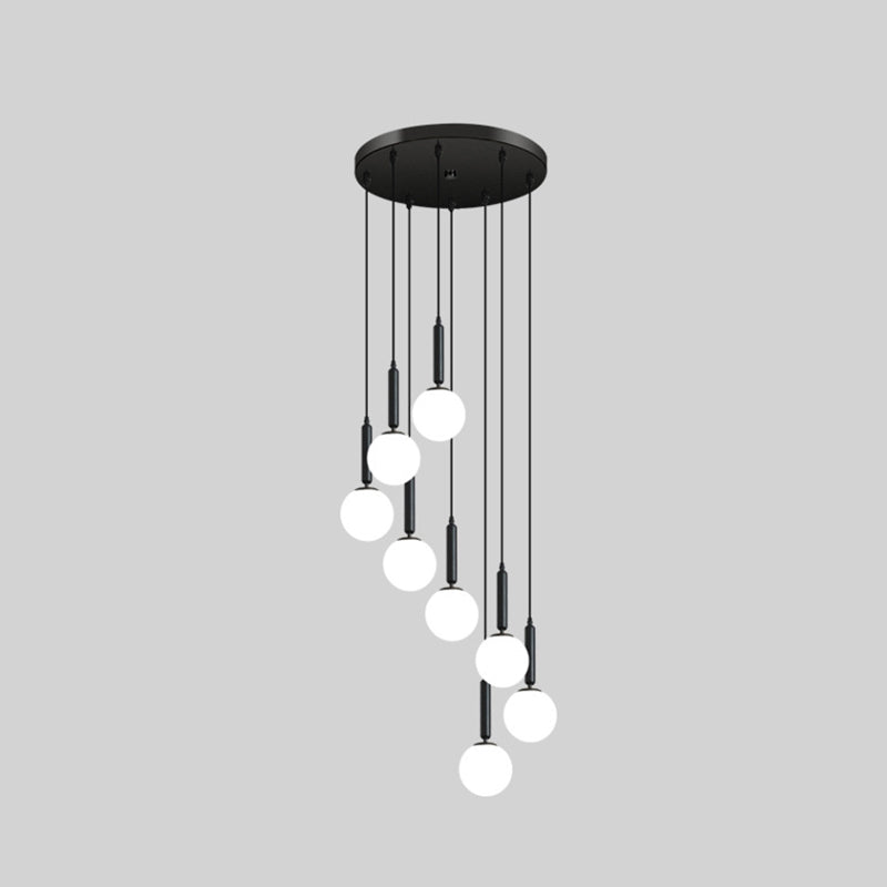 Modern Minimalist Multiple Globe Shade Pendant Light Metal Long Hanging Lamp for Living Room 8 Black Clearhalo 'Ceiling Lights' 'Close To Ceiling Lights' 'Glass shade' 'Glass' 'Modern Pendants' 'Modern' 'Pendant Lights' 'Pendants' Lighting' 2556894